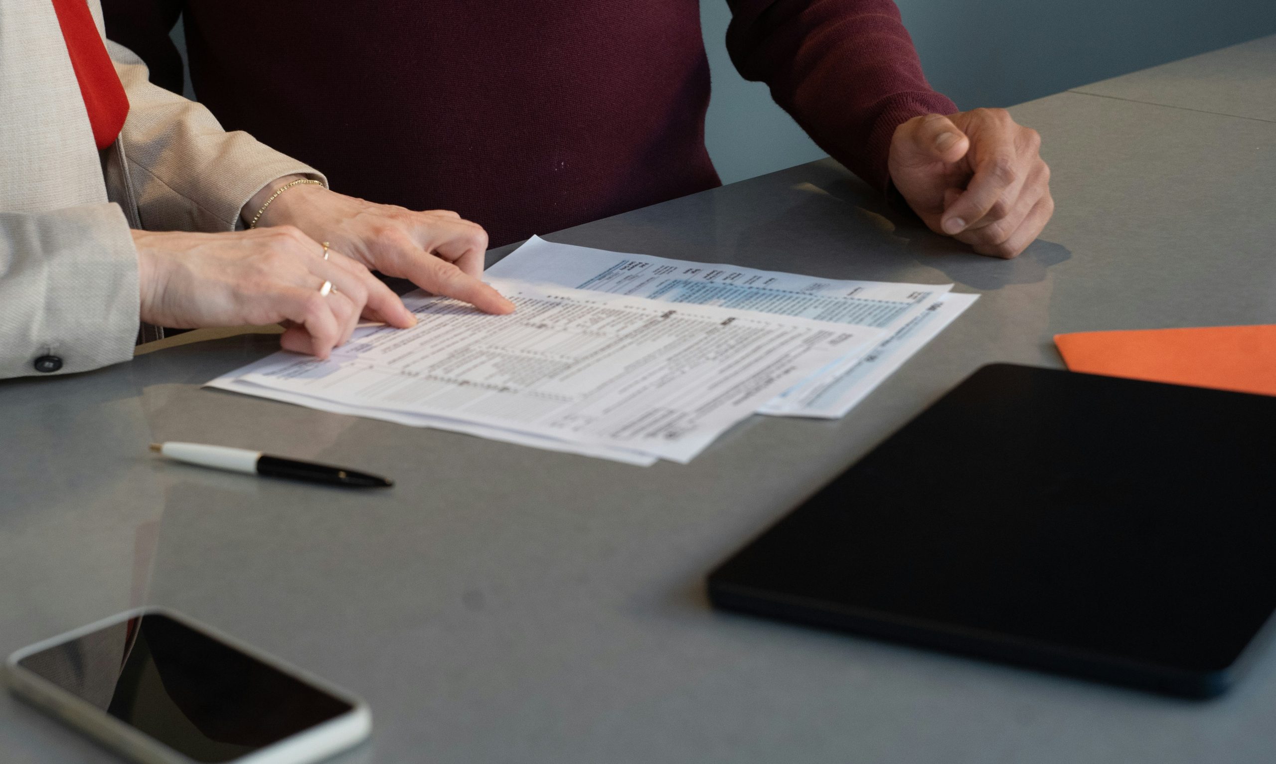 senior couple reviewing insurance options at home